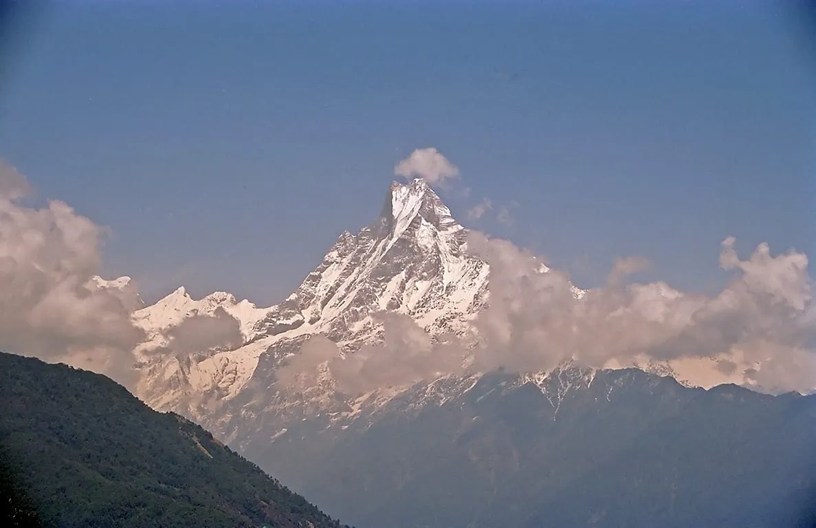 The pointed summit of Machhapuchhre at sunset