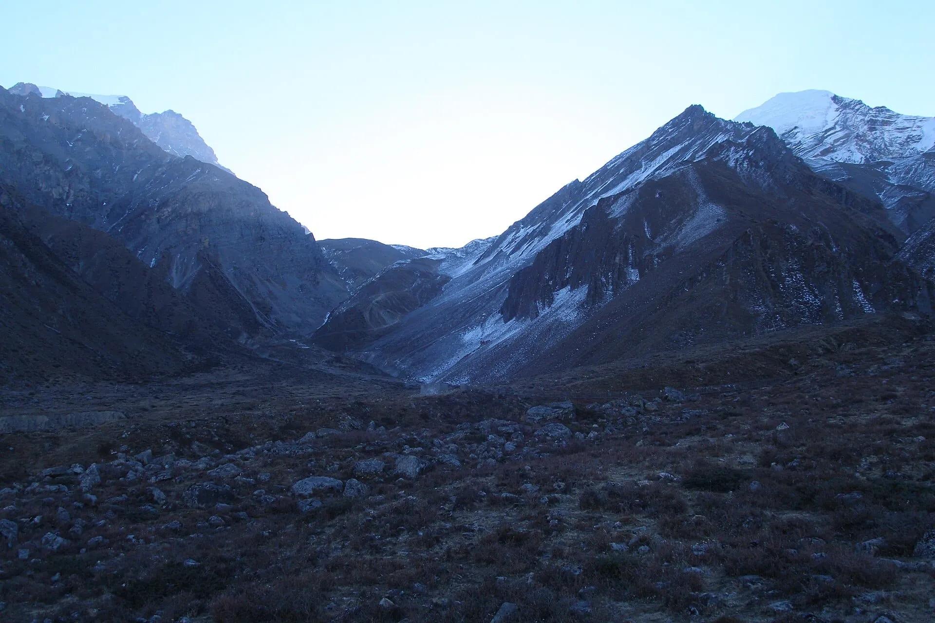 Prayer flags and snow at the Thorong La pass